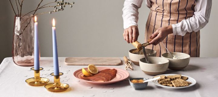 We have 4 simple starter recipes for your new year's party for you to try. Here we have the salmon and beetroot canapes being prepared in the Fossil bowls from Scandi Living.
