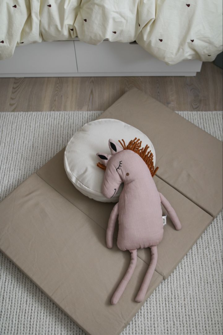 ferm LIVING has some adorable accessories for a children's bedroom like this Safari cushion horse. 