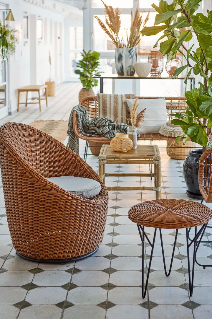 The Rocca's lounge chair from Bloomingville in rattan is a great option for a small balcony. 