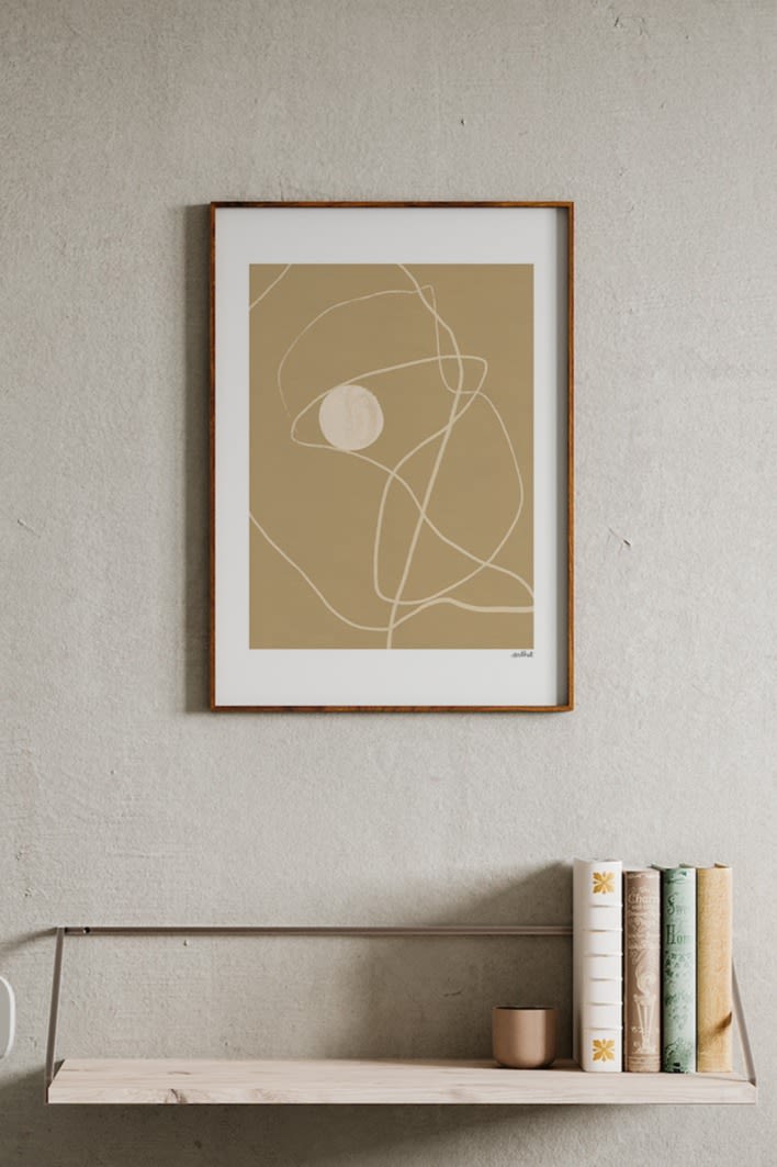 17 stylish Scandinavian wall posters to give your walls an update - here you see the graphic Little Pearl poster from Paper Collective in tones of white and beige.