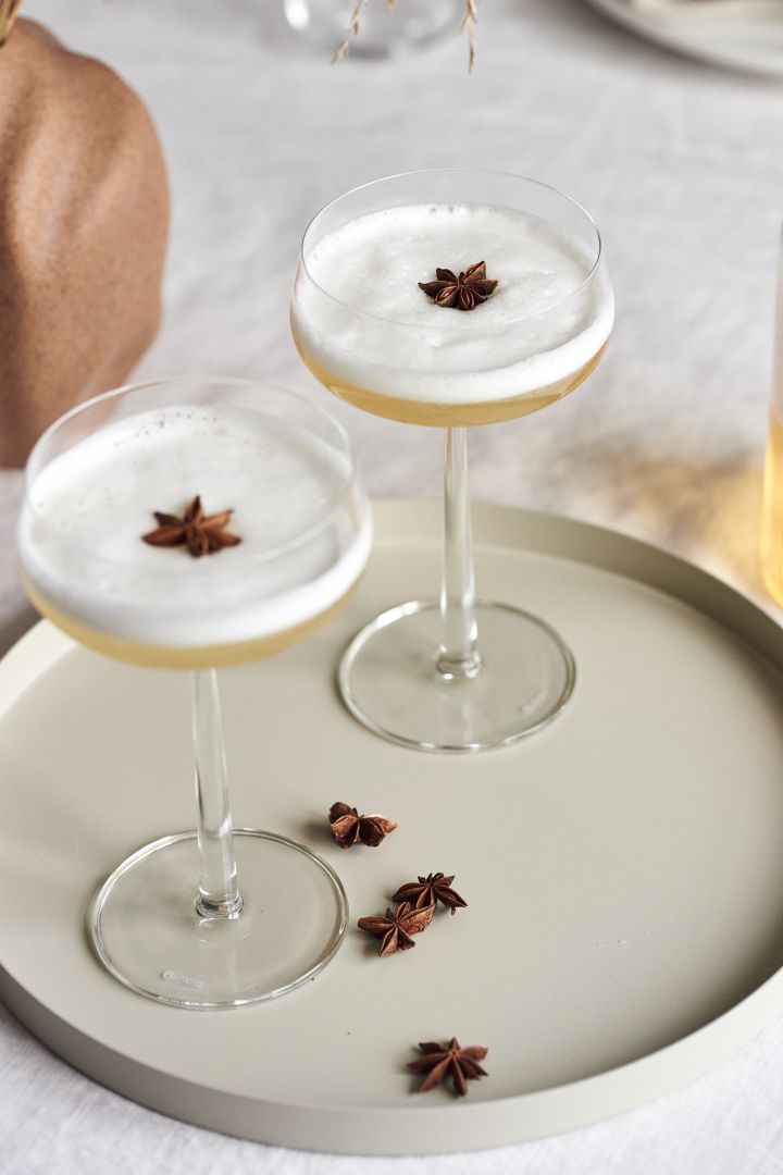 4 festive cocktail recipes for new year - drinks in Iittala Essence Cocktail glass on tray from Cooee Design.