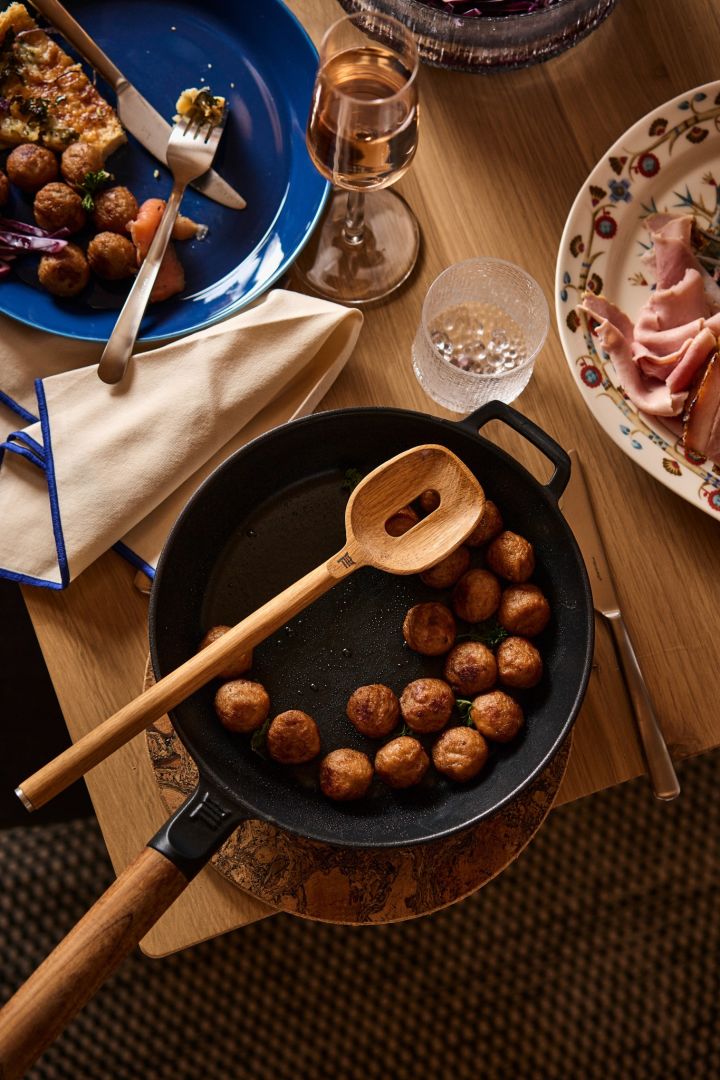 Meatballs in a cast iron frying pan from Fiskars, a traditional part of a Nordic Christmas celebration. 