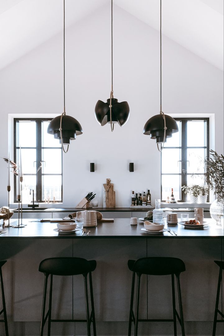 Consider whether you want mood or functional lighting in the kitchen. Here you see a collection of Gubi's Multi-Lite hanging in the kitchen of Swedish influencer @arkihem. 