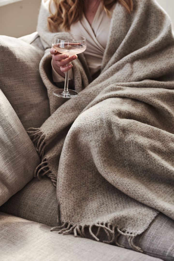A luxurious wool thrown such as this Sandstone throw from Scandi Living makes the ideal anniversary gift idea for couples who like cosy interior design. 