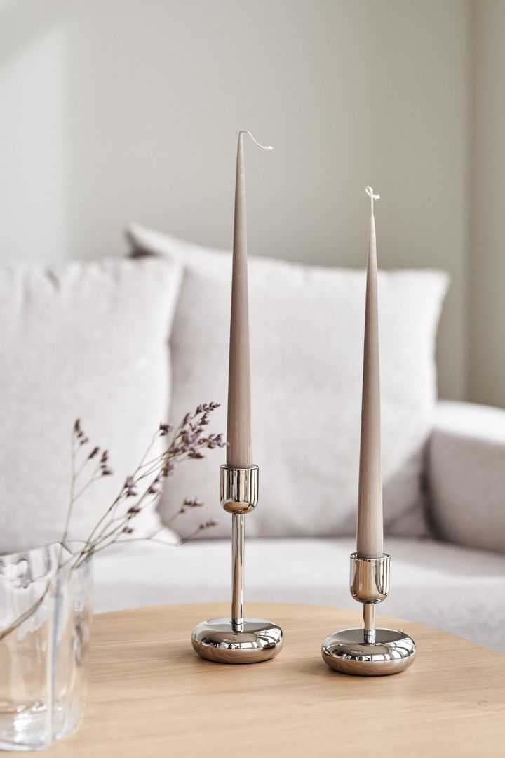 Nappula candlesticks in stainless steel from Iittala with candles from Ester & Erik.