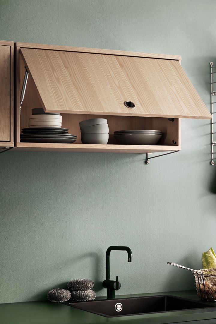 String shelf kitchen system in a lovely oak finish. 