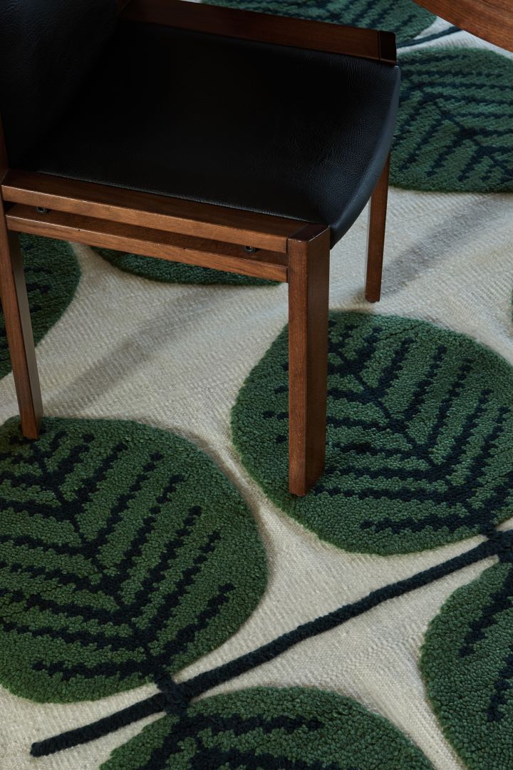 Layered's Stig Lindberg pattern rug collection offers this statement piece rug with the Berså pattern in white and green - in line with autumn interior design trends.
