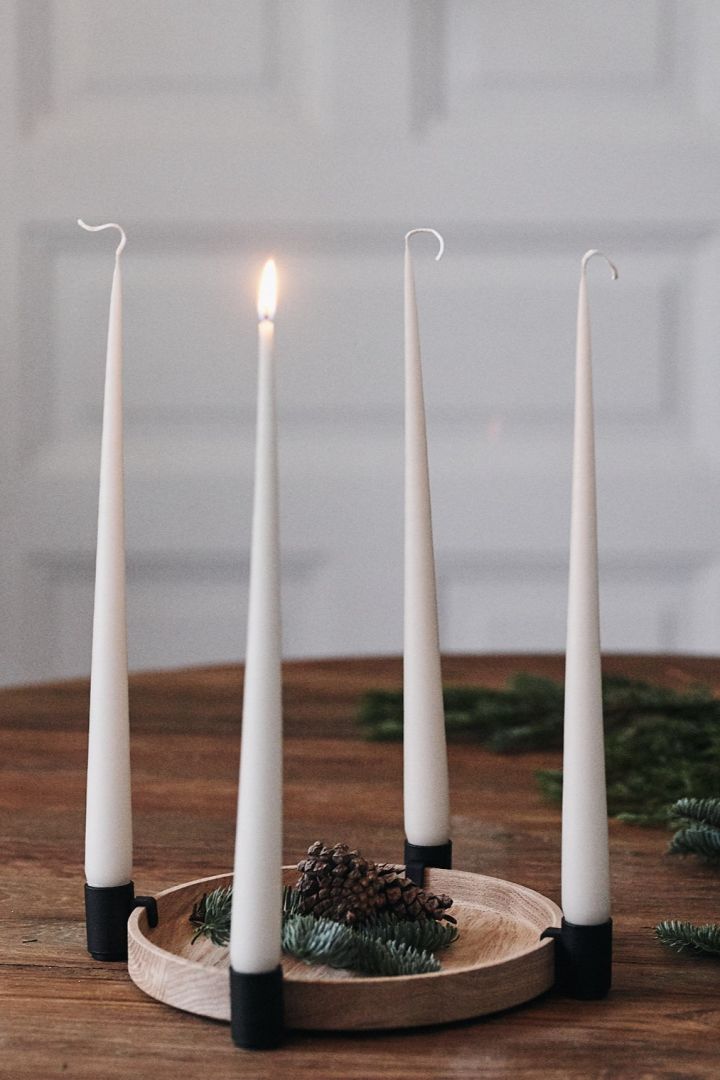 How to decorate with traditional Scandinavian Christmas decorations - the Luna candle holder from Applicata looks lovely placed on the Christmas table. The candle holders are adjustable so you can choose how to space your candles. 